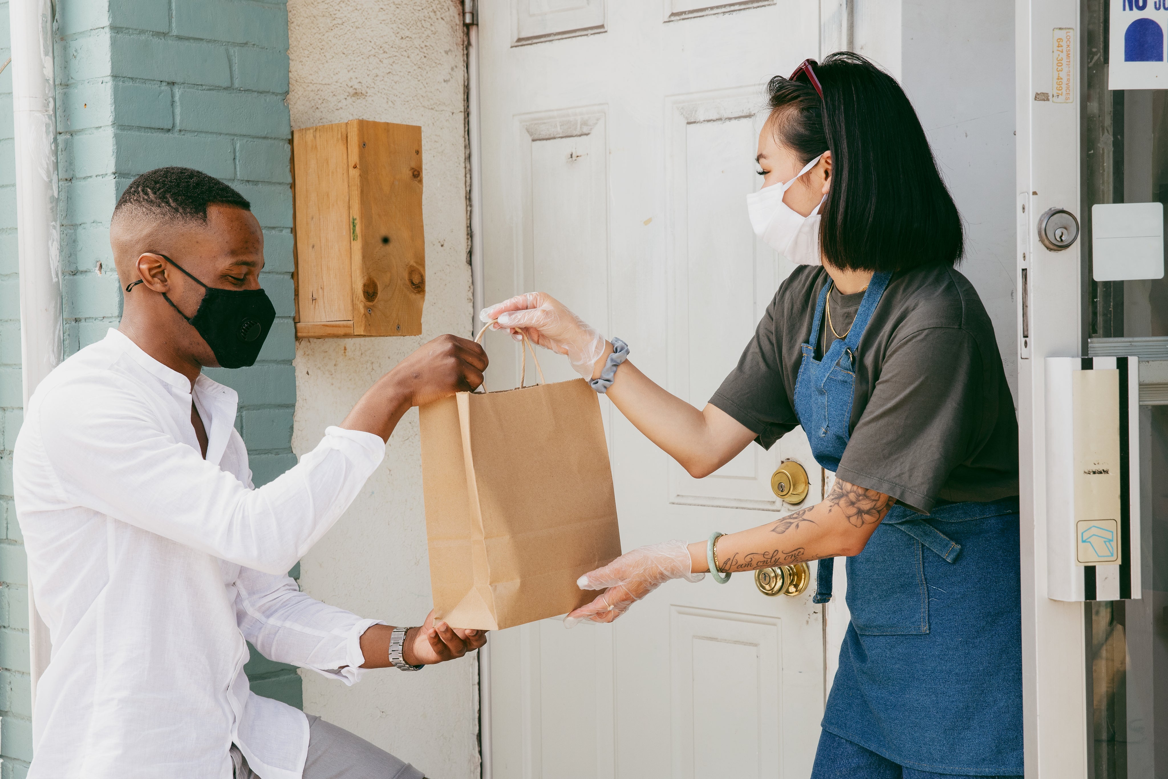 Customer receiving an order from a retail store